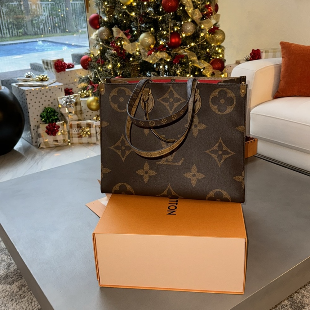 Authentic Louis Vuitton OnTheGo GM with original box, dust bag and care card